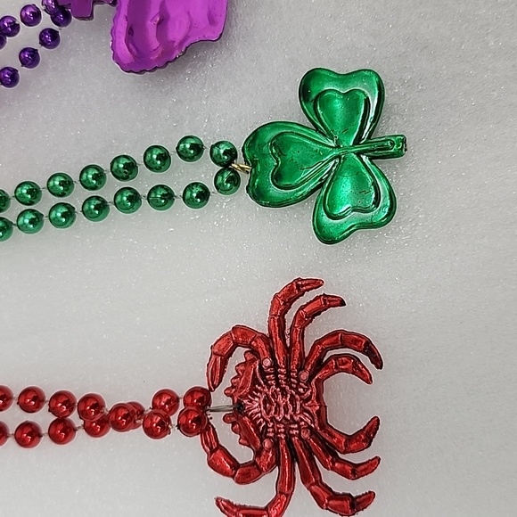 Mardi Gras Purple Crown, Green Shamrock, Red Crab,and Orange shot cup Necklaces. - Picture 6 of 7